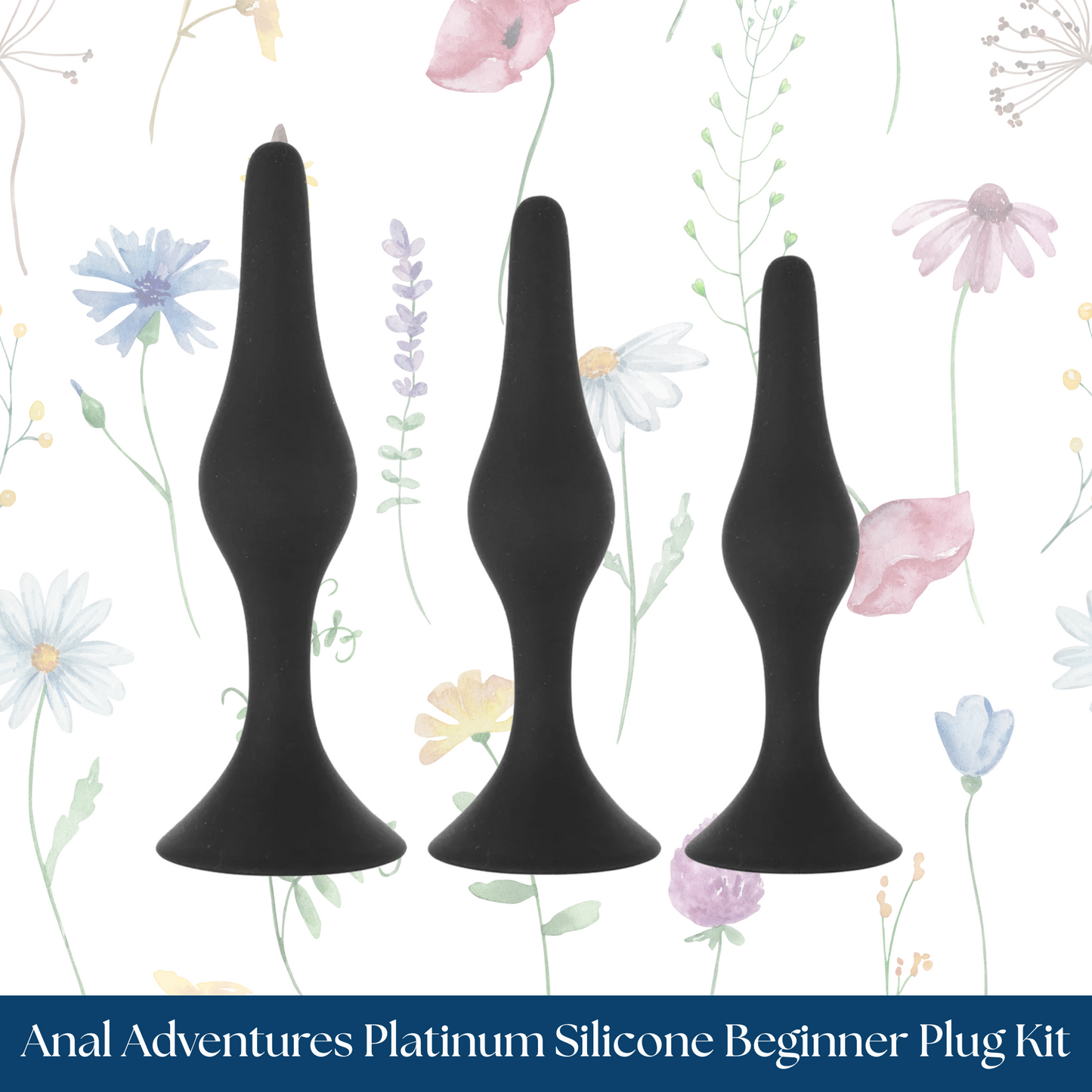 Three black silicone plugs on a floral background with 'Anal Adventures Platinum Silicone Beginner Plug Kit' text.