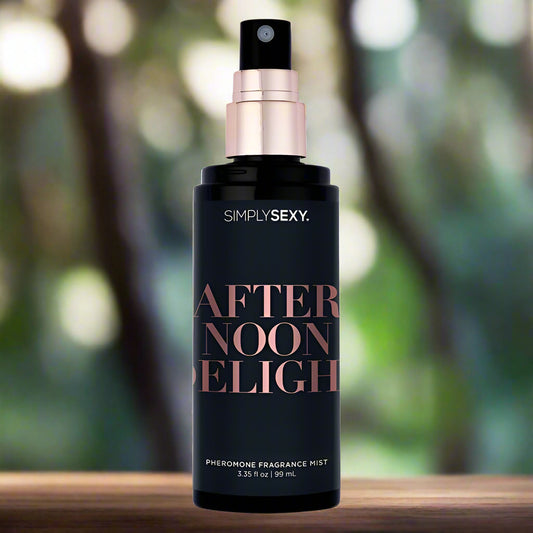 Black bottle of 'Simply Sexy After Noon Eligh' fragrance mist on a white background