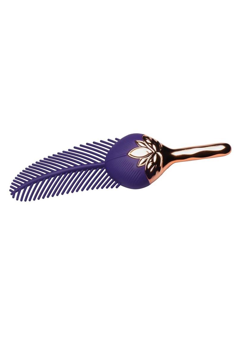 Purple silicone feather with rose gold handle on a white background