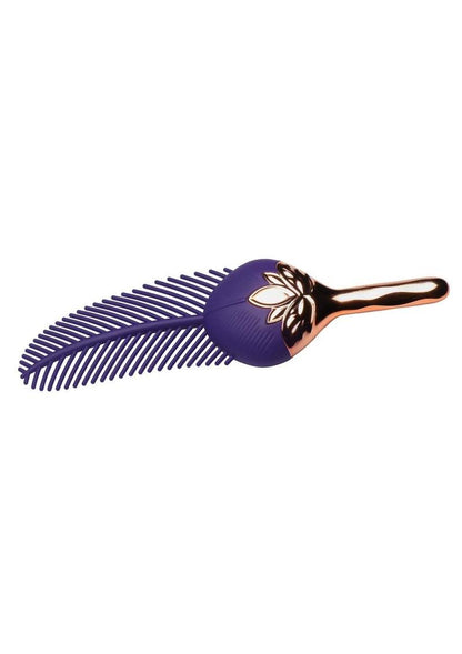 Purple silicone feather with rose gold handle on a white background